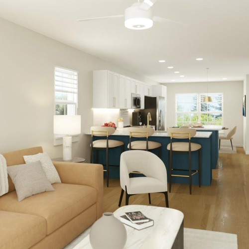 Generous living spaces with beautiful natural lighting a living room with a couch and a table