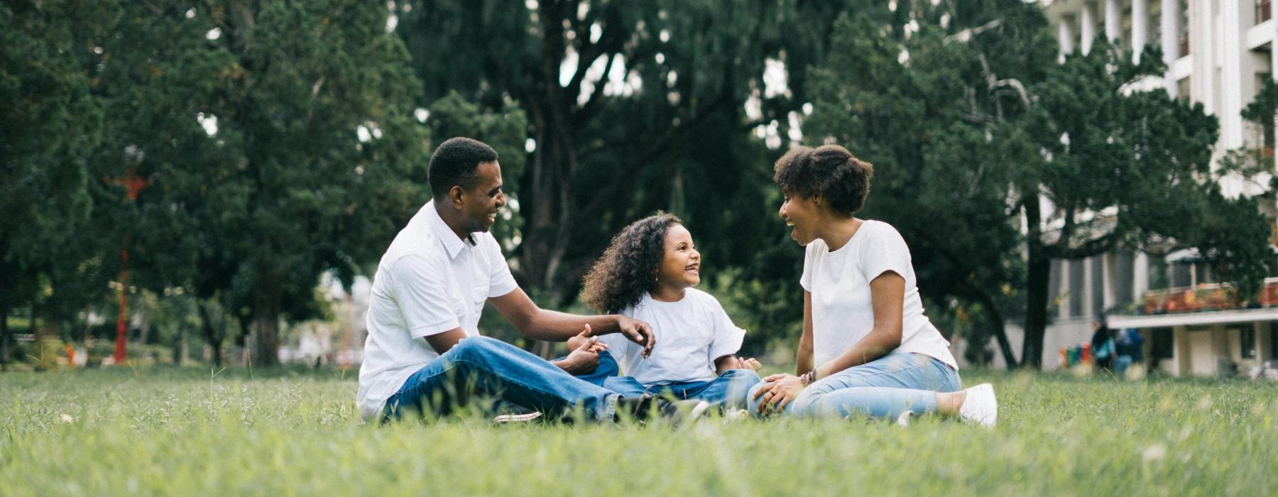 Find your perfect fit at The Groves a family sitting on the grass