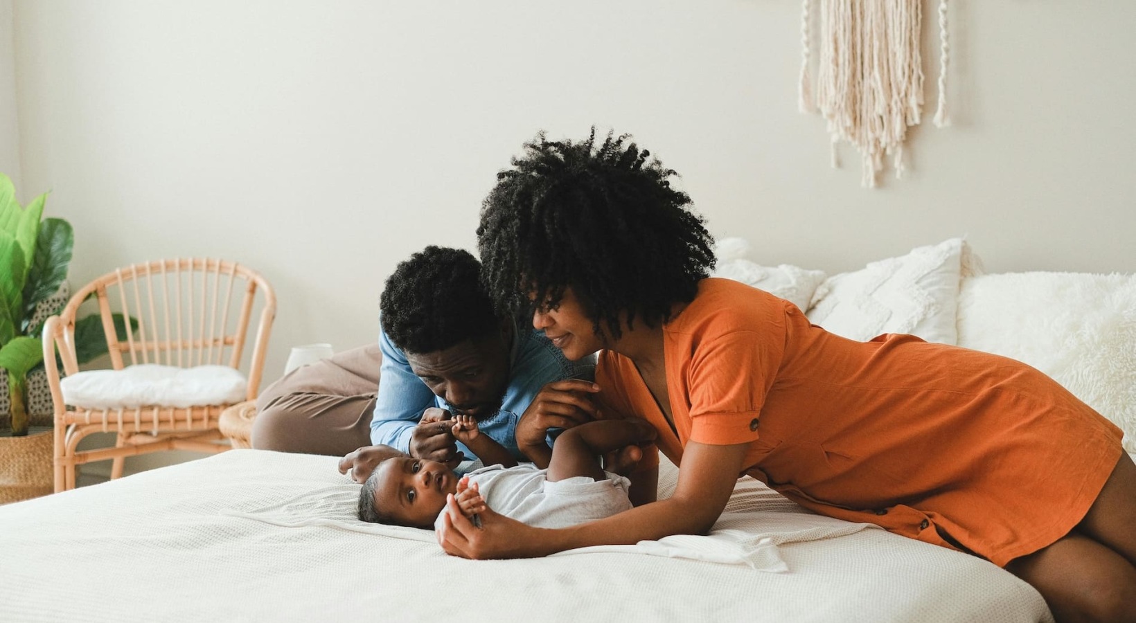 Relax and recharge in beautiful and spacious bedrooms a family embracing on a bed