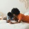a family embracing on a bed