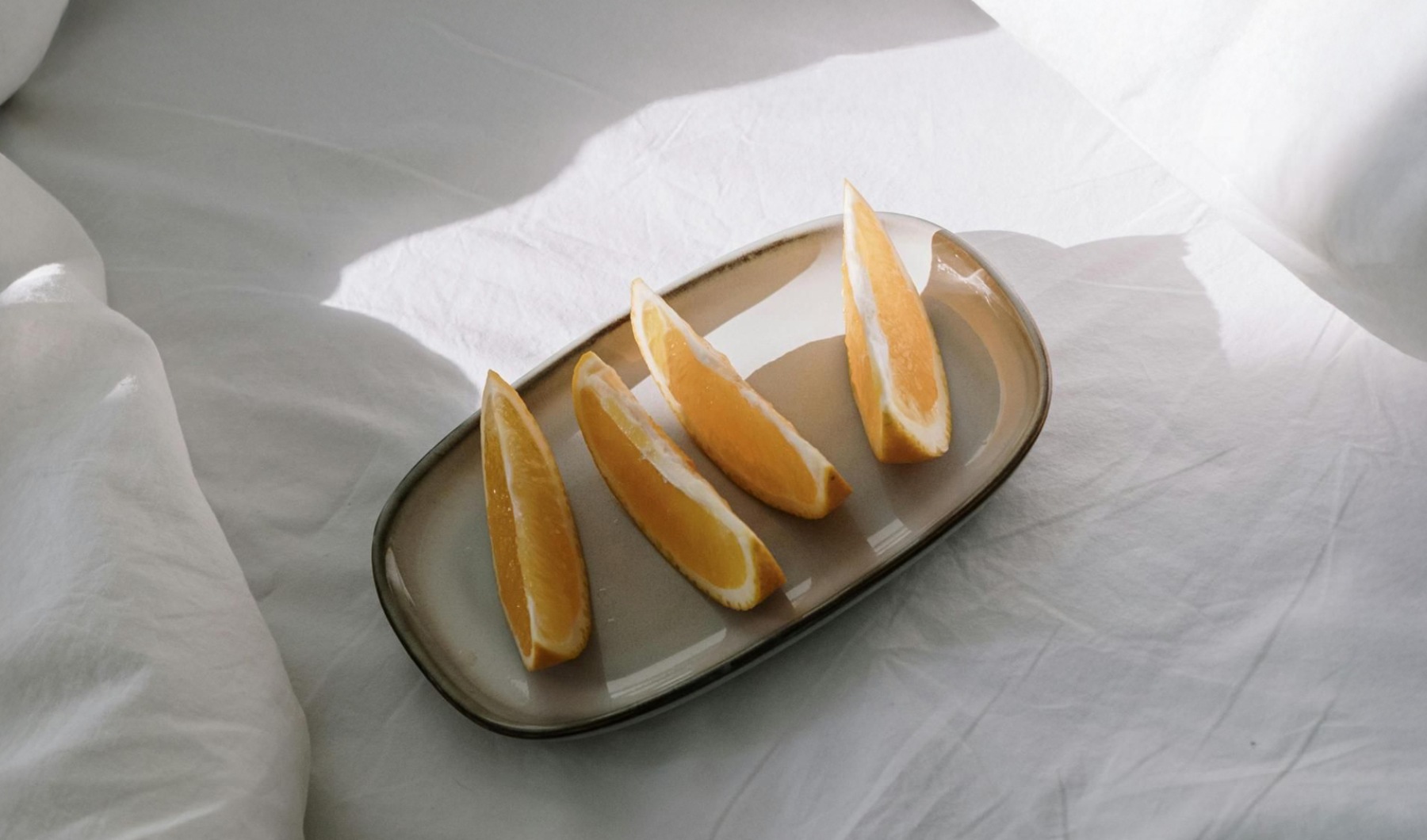 It's time to Take Root orange slices on a bed